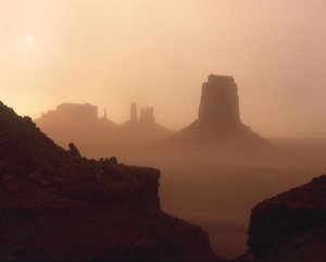 Tim Fitzharris - Sandstorm enshrouding mittens, Monument Valley, Arizona
