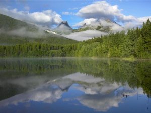 Tim Fitzharris - Fortress Mountain shrouded in clouds, reflected in lake, Kananaskis Country, Alberta, Canada
