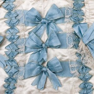 Unknown 18th Century Swedish Needleworker - Detail of blue ribbon work on a child's silk shirt, ca. 1775