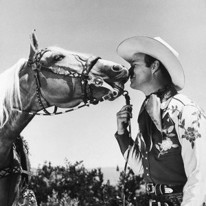 Hollywood Photo Archive - Trigger kissing Roy Rogers