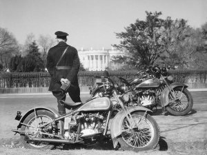 Theodor Horydczak - Police guard with motorcycle, White House in rear, early 20th Century