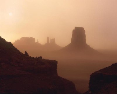 Tim Fitzharris - Sandstorm enshrouding mittens, Monument Valley, Arizona