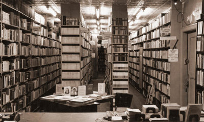 Angelo Rizzuto - Interior view of bookstore, New York City, mid 20th Century