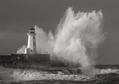 Pangea Images - Lighthouse in raging Sea (B&W)