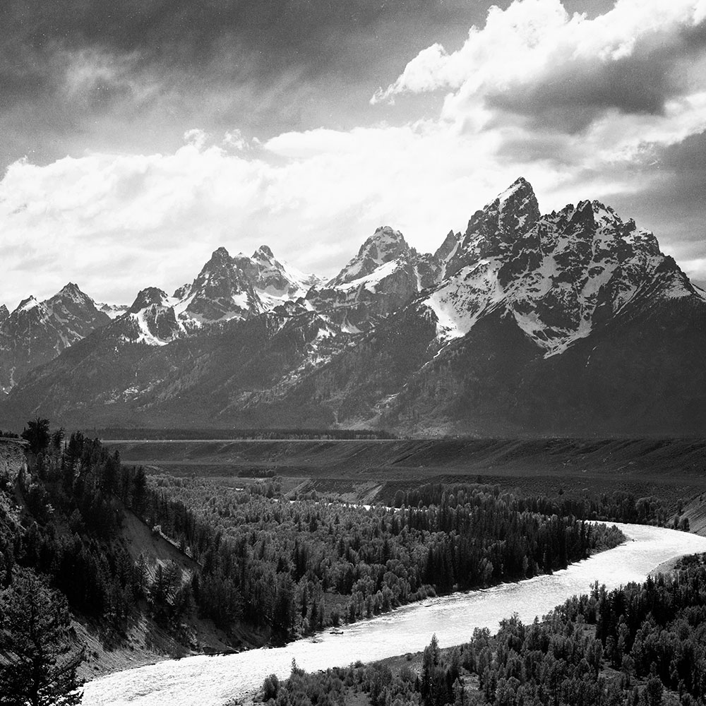 Ansel Adams, View from river valley towards snow covered mountains, river in foreground, Grand Teton National Park, Wyoming , 1941