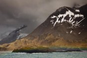 Colin Monteath - Rainbow over rocks at entrance to Fortuna Bay, South Georgia Island, Antarctica