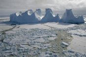 Tui De Roy - Water worn iceberg in sea ice, Lazarev Sea, east Antarctica