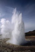 Tui De Roy - Steam spews from erupting geysers, Iceland
