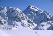 Colin Monteath - Skiers cross frozen Lake Harris, Routeburn Track, Mt Aspiring NP, New Zealand