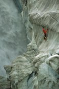 Colin Monteath - Ice climber in Fox Glacier crevasse near Victoria Falls, Westland NP, New Zealand