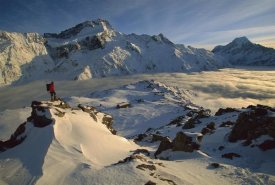 Colin Monteath - Mt Sefton climber above Mueller Glacier and hut, Mt Cook NP, New Zealand
