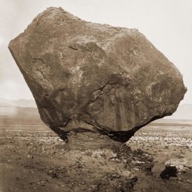 William H. Bell - Perched Rock, Rocker Creek, Arizona, with sitting man, 1872