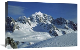 Colin Monteath - Ski mountaineer near summit with Mt Tasman behind, Westland NP, New Zealand
