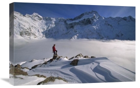 Colin Monteath - Mt Sefton, climber above cloud-filled Mueller Glacier, Mt Cook NP, New Zealand