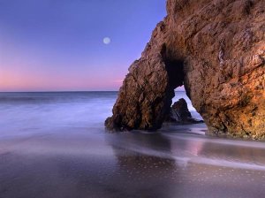 Tim Fitzharris - Sea arch and full moon over El Matador State Beach, Malibu, California