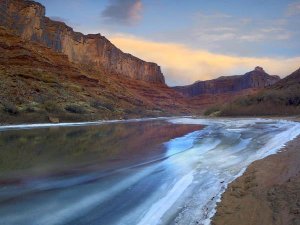 Tim Fitzharris - Ice on the Colorado River beneath sandstone cliffs, Cataract Canyon, Utah