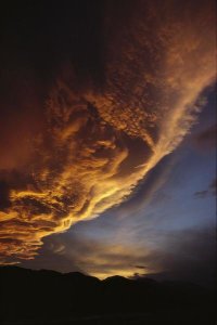 Ian Whitehouse - Sunset on storm clouds near Mount Cook, New Zealand