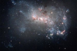 NASA - Stellar Fireworks Ablaze in Galaxy NGC 4449