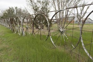Carol Highsmith - A fence made of wagon wheels near Schulenburg in Fayette County, TX