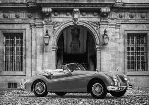 Gasoline Images - Luxury Car in front of Classic Palace (BW)