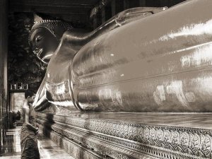 Pangea Images - Praying the reclined Buddha, Wat Pho, Bangkok, Thailand (sepia)