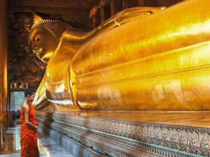 Pangea Images - Praying the reclined Buddha, Wat Pho, Bangkok, Thailand