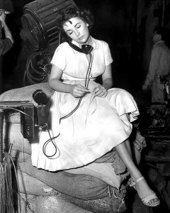 Hollywood Photo Archive - Elizabeth Taylor on the phone backstage