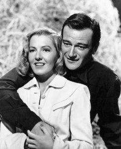 Hollywood Photo Archive - John Wayne with Jean Arthur