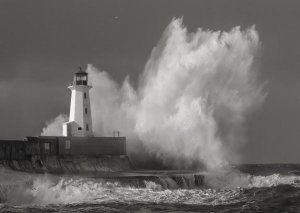 Pangea Images - Lighthouse in raging Sea (B&W)