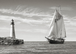 Pangea Images - Sailboat approaching Lighthouse, Mediterranean Sea