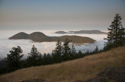 Matthias Breiter - Entrance Mountain and Mount Woolard emerge from sea fog around Orcas Island, San Juan Islands, Washington