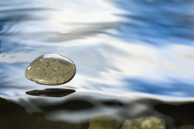 Michael Durham - Skipping stone just about to hit the water's surface