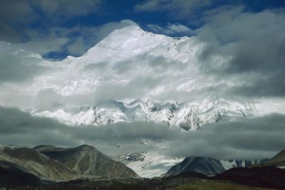 Colin Monteath - Morning mist clearing over Mount Everest after dawn, Tibet