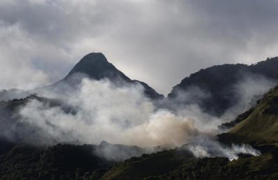 Pete Oxford - Fire set by chagras or cowboys to help herd cattle, Andes Mountains, Ecuador