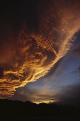 Ian Whitehouse - Sunset on storm clouds near Mount Cook, New Zealand