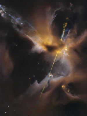 NASA - A Newborn Star Shoots Twin Jets Out Into Space