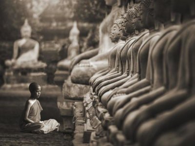 Pangea Images - Young Buddhist Monk praying, Thailand (sepia)