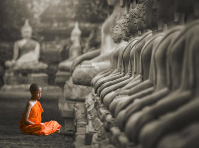 Pangea Images - Young Buddhist Monk praying, Thailand (BW)