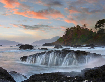 Tim Fitzharris - Water flowing off coastal rocks, Roca Loca Point, Jaco, Costa Rica