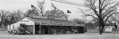 Arthur Rothstein - U.S. Highway 80, Texas, between Dallas and Fort Worth. Roadside stand, 1942