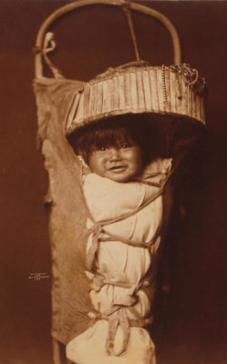Edward S. Curtis - An Apache babe, ca. 1903