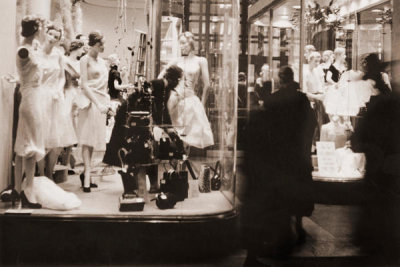 Angelo Rizzuto - Worker arranging a 42nd St. shop window, New York City, 1953